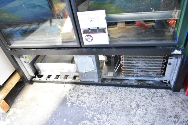 2021 True TVM-48SL-HC Commercial 2 Door Cooler Merchandiser, 115 Volts, 1 Phase, visible condenser, installation note displayed.