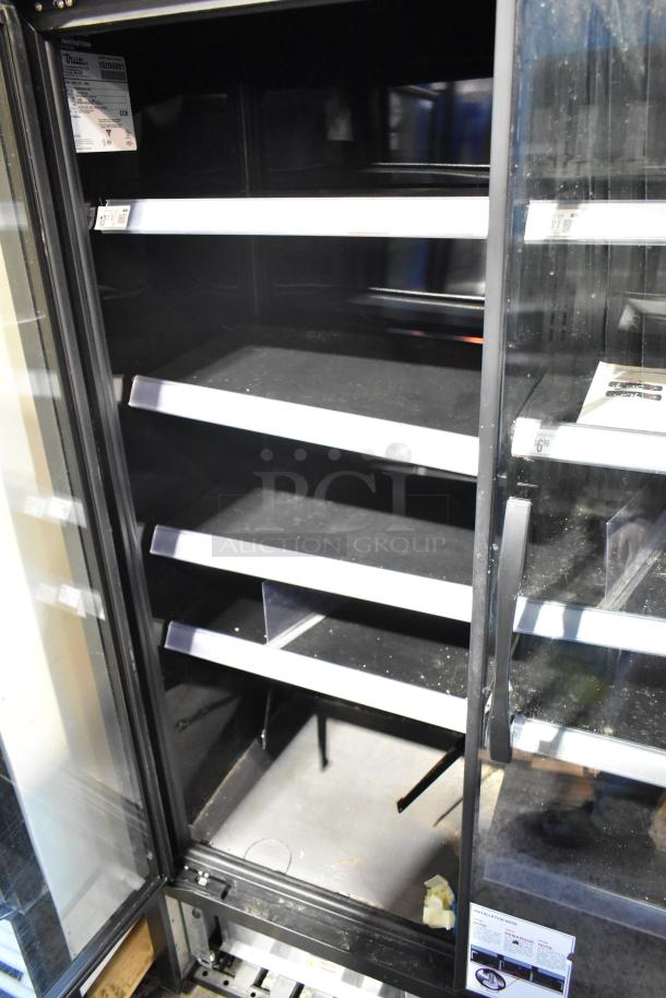 2021 True TVM-48SL-HC 2 Door Reach-In Cooler, commercial grade, glass doors, interior shelving, 115 volts, 1 phase.