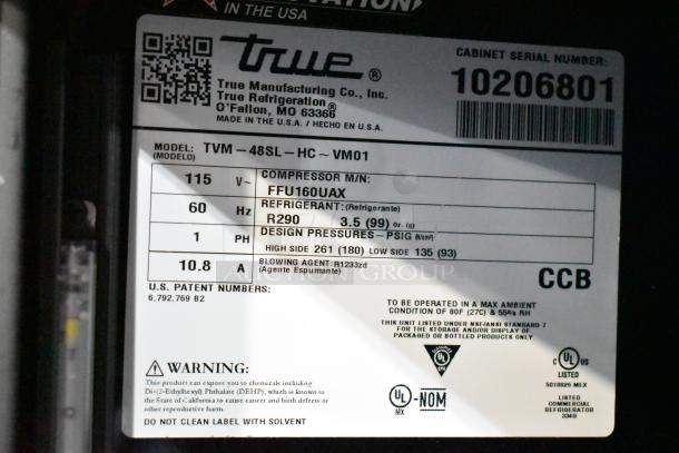 Label for 2021 True TVM-48SL-HC cooler, 115 volts, 1 phase. Details model, refrigerant R290, and serial number 10206801.