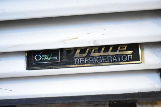 True GDM-72-HC-LD commercial cooler label showing "natural refrigerant" and "True Refrigerator."