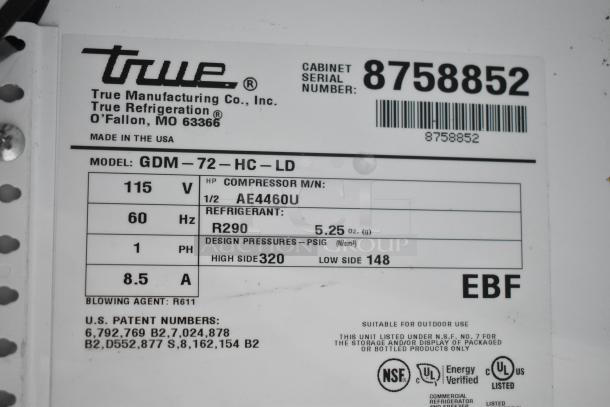True GDM-72-HC-LD cooler label showing 115 volts, 1 phase, compressor model AE4460U, and refrigerant R290 details.