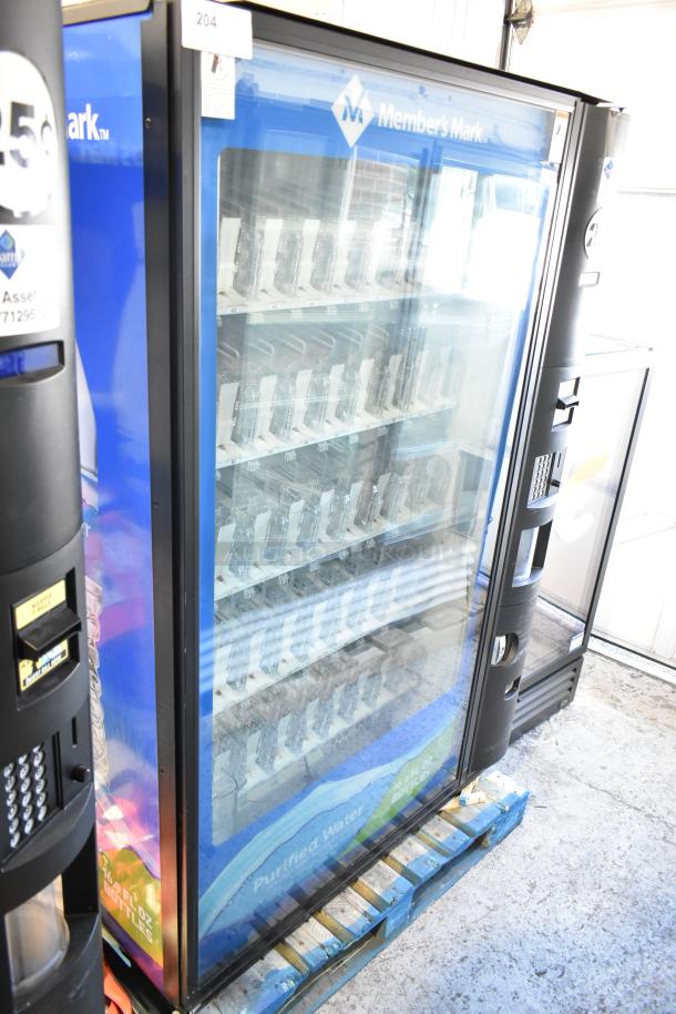 Crane 5800-4 metal vending machine with bill acceptor, 115V, 1 phase, good condition, holds bottled drinks.