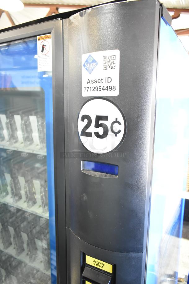 Crane 5800-4 metal commercial drink vending machine with bill acceptor, 115 volts, 1 phase. Price tag 25 cents. Asset ID visible.
