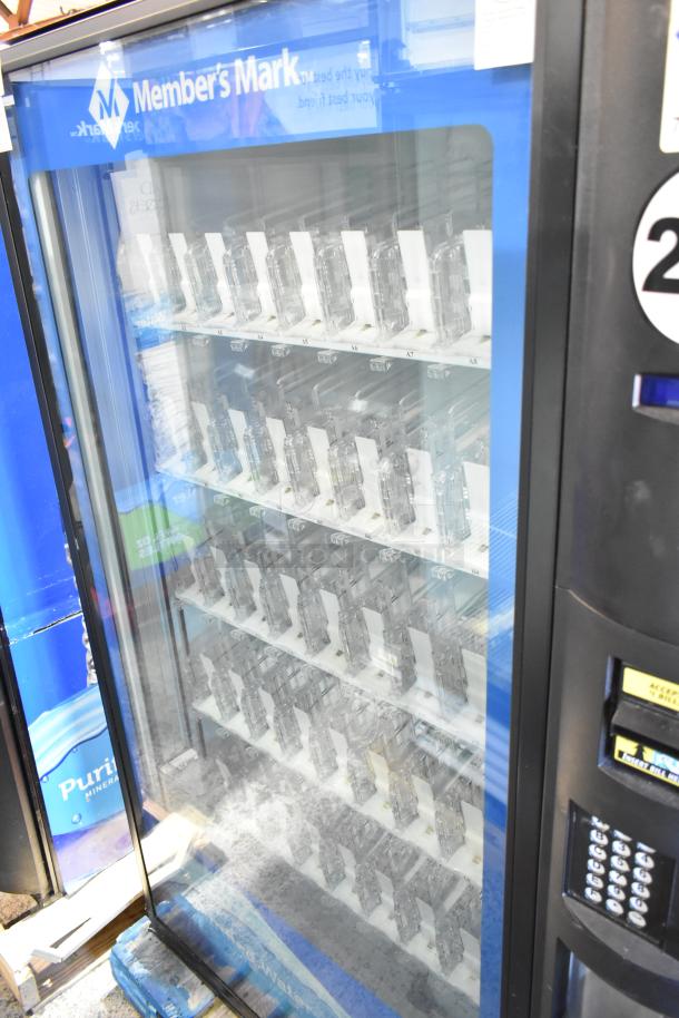 Crane 5800-4 metal vending machine, commercial-grade, accepts bills, 115V, 1-phase, visible selector buttons, excellent condition.