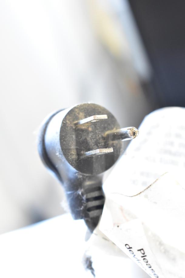 Crane 5800-4 metal commercial drink vending machine with bill acceptor, 115 volts, 1 phase. Plug detail shown.