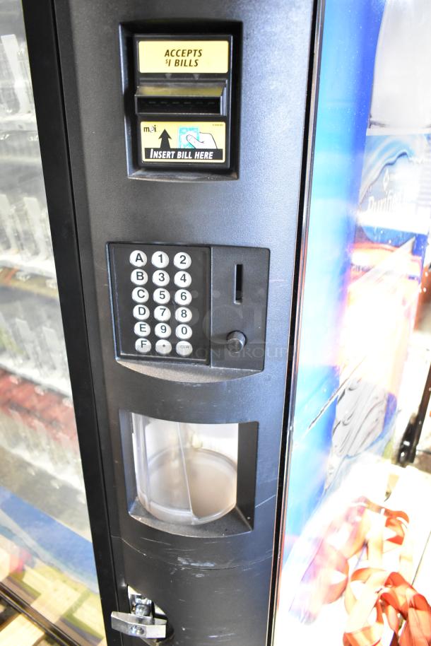 Crane 5800-4 vending machine, metal build, bill acceptor, keypad, for bottled drinks, 115 volts, 1 phase.