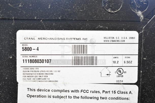 Crane 5800-4 Metal Vending Machine label showing model, serial number 111808030107, 115V, 1 phase, UL listed.