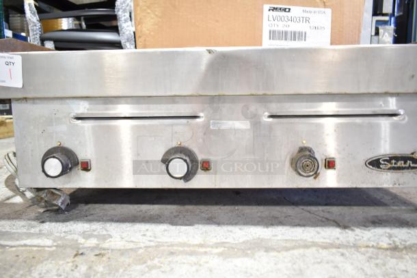 Star Commercial Electric Flat Top Griddle, countertop model, stainless steel, three control knobs, visible wear.