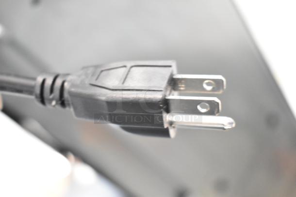 Boltic 6873518LYB air curtain power plug, close-up. Black aluminum, brand new, 72", 120V, 1-phase. Remote magnetic door switch.