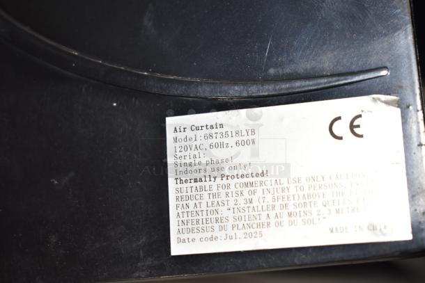 BRAND NEW Boltic 6873518LYB 72" Black Aluminum Air Curtain with Remote Magnetic Door Switch. 120V, 1 Phase. Scratch and dent marked. Labels indicate 120VAC, 60Hz, 600W, thermally protected.