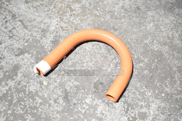 Orange curved pipe on concrete floor, indicating part of Fryclone 100 lb. Fryer Oil Disposal Unit, labeled scratch and dent.