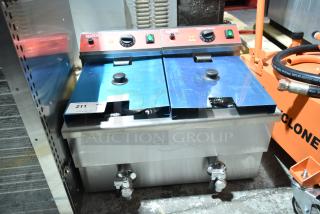 2025 Avantco 177F202 30 lb. dual tank electric countertop fryer with two baskets and lids. Brand new with minor scratches.