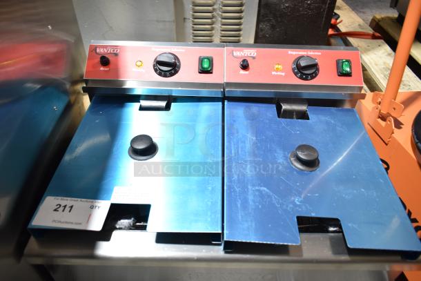 Avantco 177F202 2025 dual tank electric fryer, 30 lb. capacity, scratch and dent, includes 2 metal fry baskets and lids.