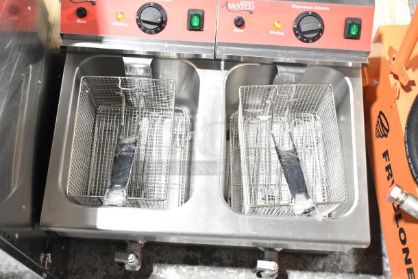 Brand new Avantco 177F202 dual tank electric fryer with two metal baskets and lids. Scratch and dent condition. 208-240V.