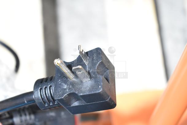 Close-up of a power plug for the Avantco 177F202 countertop fryer, showcasing the plug's condition and compatibility for 208-240 volts, 1 phase.