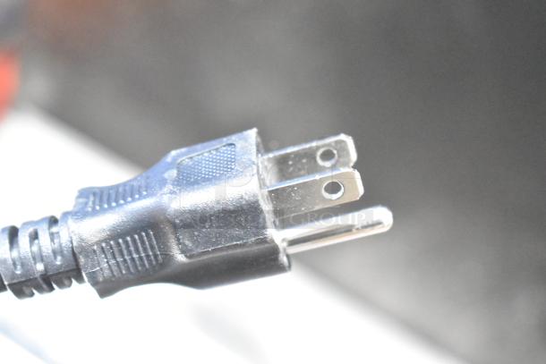 Close-up of a power plug for the Avantco 177LT93 stainless steel food dehydrator, 120 volts, 1 phase.