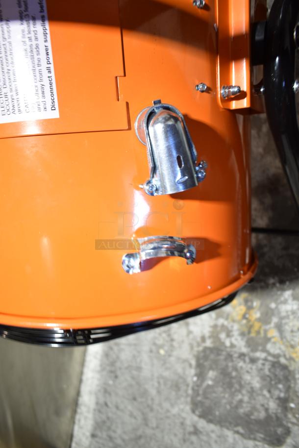 BRAND NEW Boltic SHAG-K12F Portable Electric Salamander Heater, 480V, 3 Phase. Visible scratch and dent, orange casing.