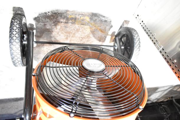 Brand new Boltic SHAG-K12F Portable Electric Salamander Heater, 480V, 3Phase, with scratch and dent. Features wheels and grille.