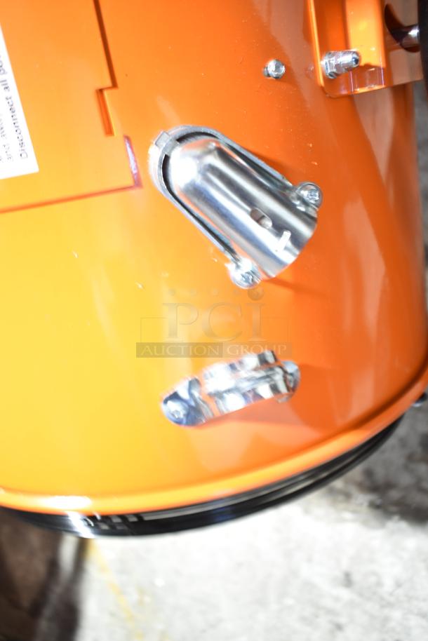 Brand new Boltic SHAG-K12F salamander heater, 480V, 3-phase, minor scratches, orange body, metal fixtures visible.