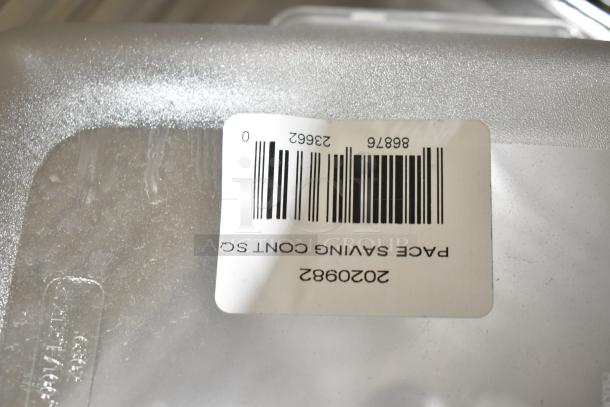 Auction lot with various containers, drop-in bins, lids. Includes visible barcode label with number 2020982.