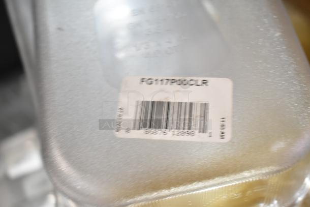 Lot of various items including drop-in bins and lids. Visible label reads "FG117P00CLR" with barcode.