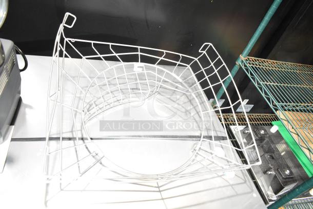 Eight-piece citrus juicer set. Includes metal racks, showing minor wear. Ideal for juicing enthusiasts. No visible brand markings.