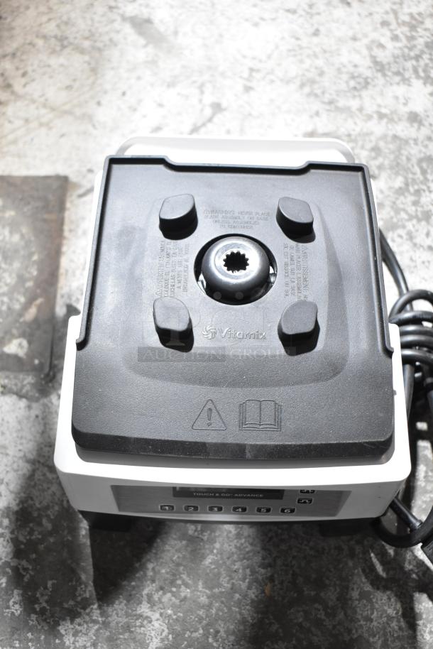 2025 VitaMix VM0214 commercial countertop blender, 120 volts, 1 phase. Features control panel and sturdy build.