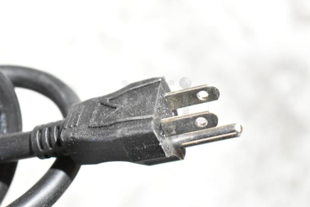 Close-up of a two-prong electrical plug from a 2025 VitaMix VM0214 Commercial Countertop Blender, indicating 120 Volts, 1 Phase.