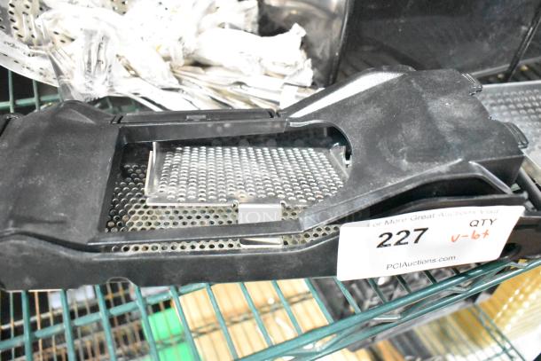 Auction item lot including a black plastic device with perforated metal, bundled 3-tined forks, and label marked "227".