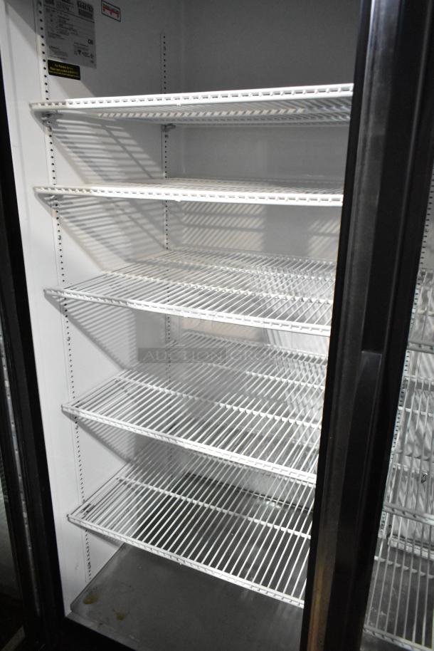 2018 True GDM-72-HC 3-Door Reach-In Cooler, shelving shown, commercial use, 115V, 1 phase, excellent condition.