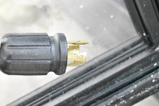 Close-up of an electrical plug for a 2020 True GDM-49F-HC commercial freezer, 115 Volts, 1 Phase.