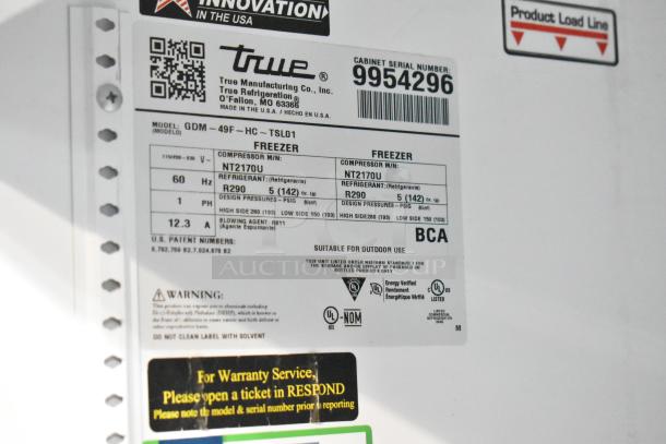 True GDM-49F-HC freezer label, detailing model, serial number 9954296, compressor type NT2170U, and refrigerant R290.