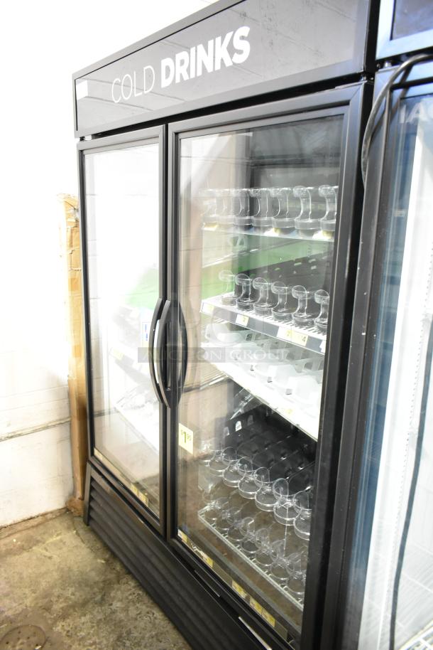 2018 True GDM-49-HC commercial 2-door reach-in cooler merchandiser, glass doors, "Cold Drinks" signage, excellent condition.