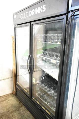 2018 True GDM-49-HC commercial 2-door reach-in cooler merchandiser, glass doors, "Cold Drinks" signage, excellent condition.