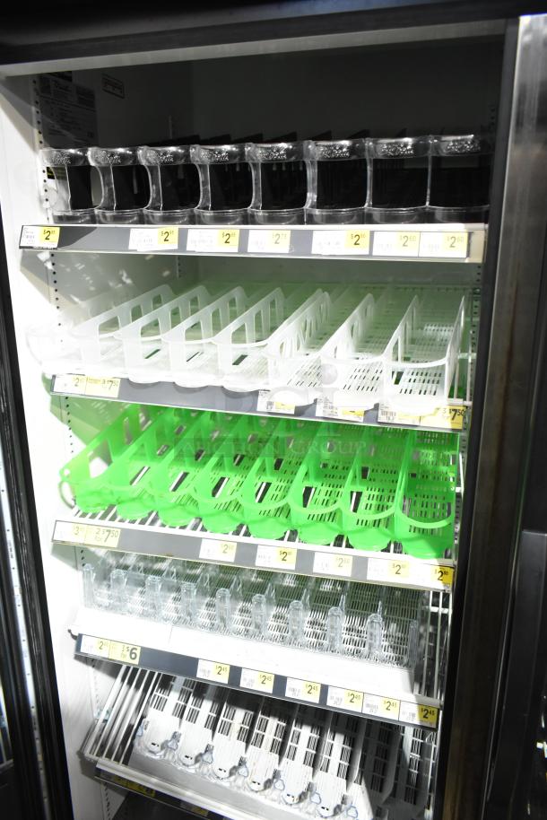 2018 True GDM-49-HC Cooler with glass doors, shelving for beverages. 115 Volts, 1 Phase. Price labels visible.