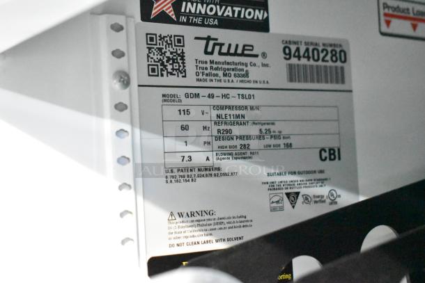 2018 True GDM-49-HC 2 Door Reach-In Cooler. Features: 115 Volts, 1 Phase. Manufacturer label details model and refrigerant info.