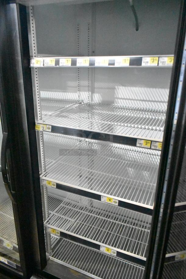 2019 True GDM-72-HC cooler merchandiser, 3-door, shelves shown, 115V, 1 phase, ideal for commercial use.