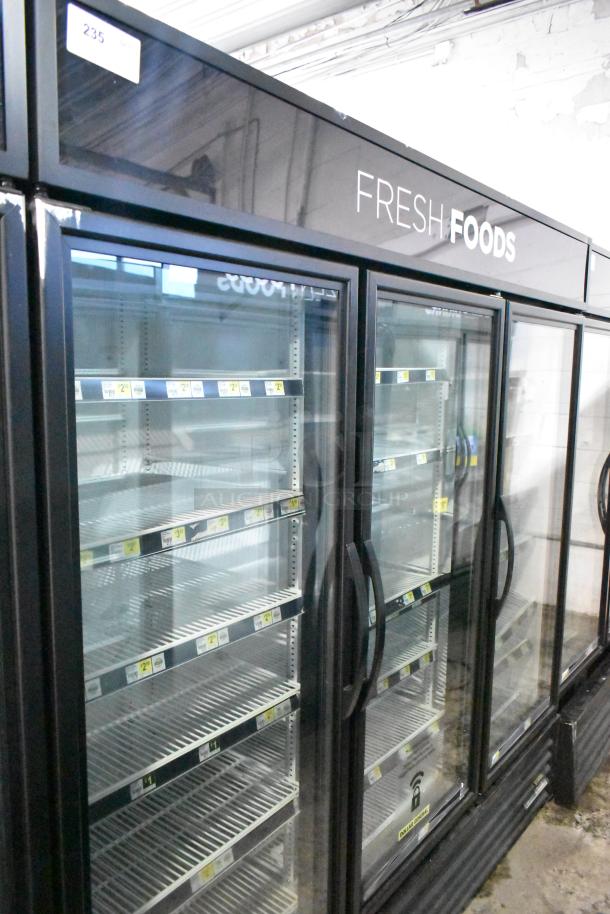 2019 True GDM-72-HC Commercial 3-Door Cooler, 115V, 1 Phase. Features glass doors, shelving, "Fresh Foods" label.