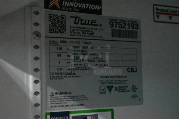 2019 True GDM-72-HC Commercial 3 Door Cooler, 115V, label shows model, refrigerant info, and warnings.