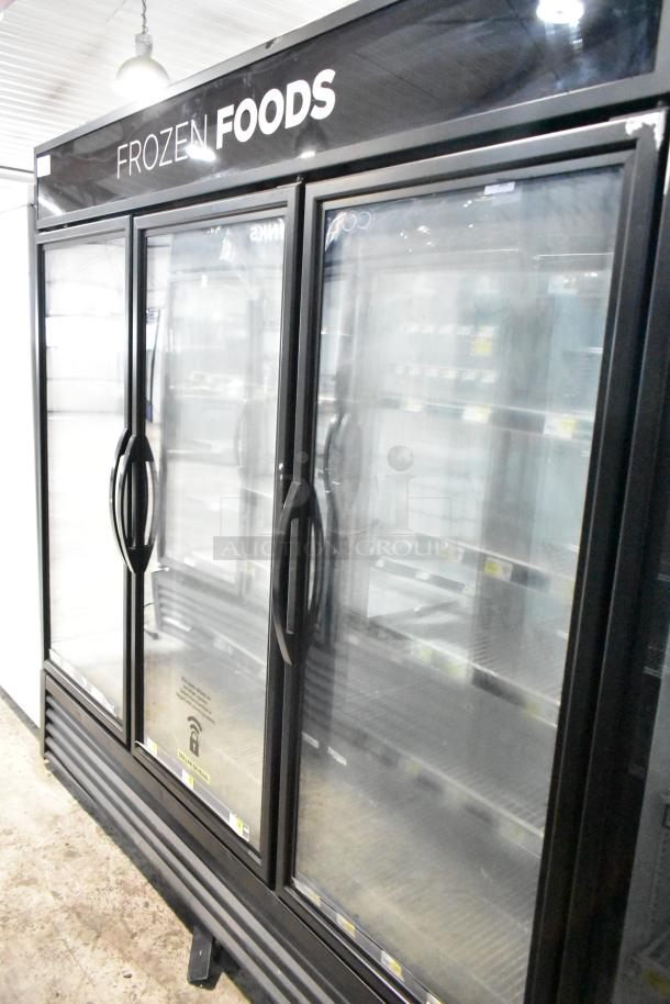 2019 True GDM-72F-HC commercial 3-door reach-in freezer merchandiser, 115 volts, excellent condition, labeled "Frozen Foods."