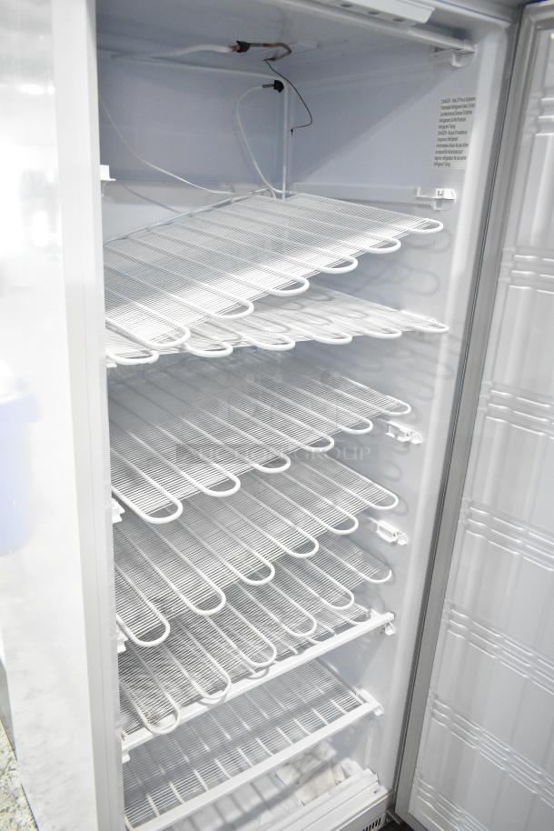 Brand new KoolMore KM-FMD20WH 21 Cu. ft. commercial reach-in freezer with wire shelves. Scratch and dent condition. 115V, 1 Phase.