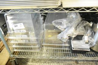 17 new kitchen items including Cambro 12189CW135 Camwear® food storage boxes and ladles on a metal shelf, labeled as scratch and dent.