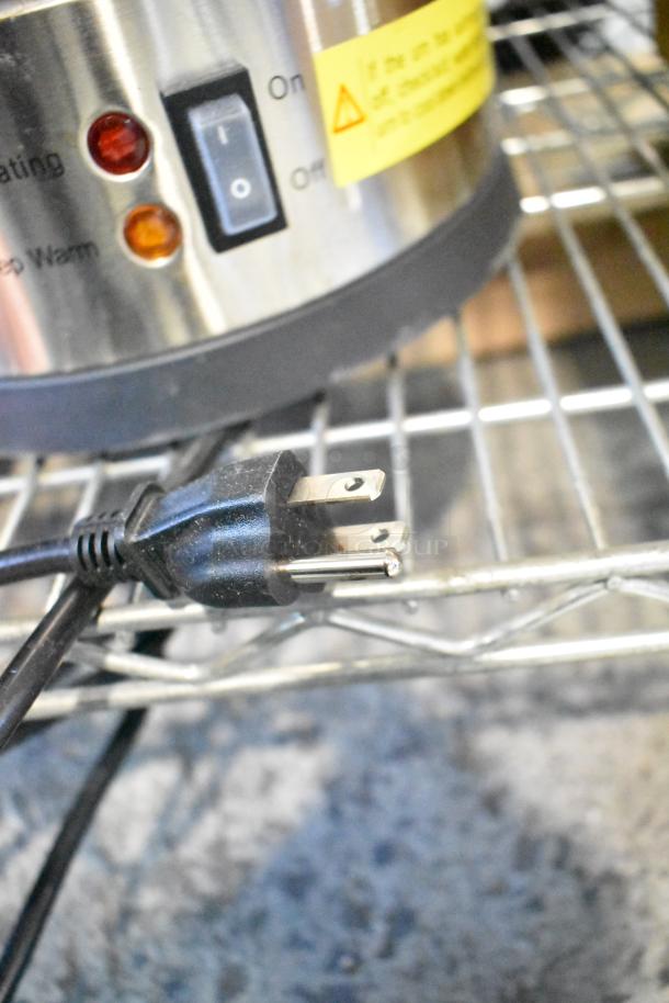 Brand new Avantco 177CU30CETL 30-cup stainless steel coffee urn; visible on/off switch and plug; 120 volts.