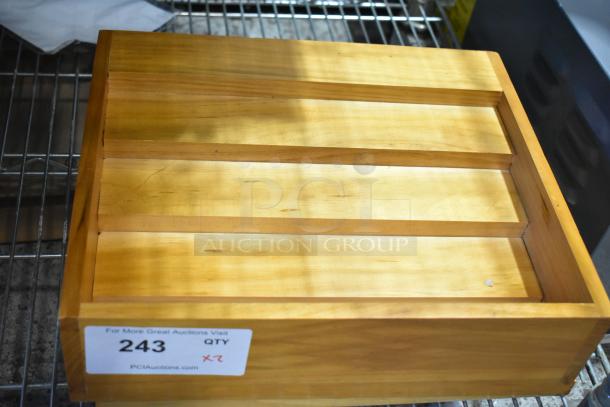 Brand new wooden organizer, scratch and dent condition. Sticker shows auction details: quantity 2, bid multiplier x2.