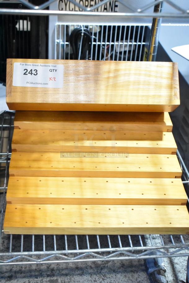 Wooden racks, brand new condition, minor scratch and dent, auction lot label visible, quantity x2.