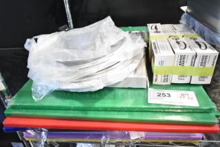 34 new scratch and dent items, including stainless steel bins, cutting boards, and Vollrath dishers. Auction lot 253.