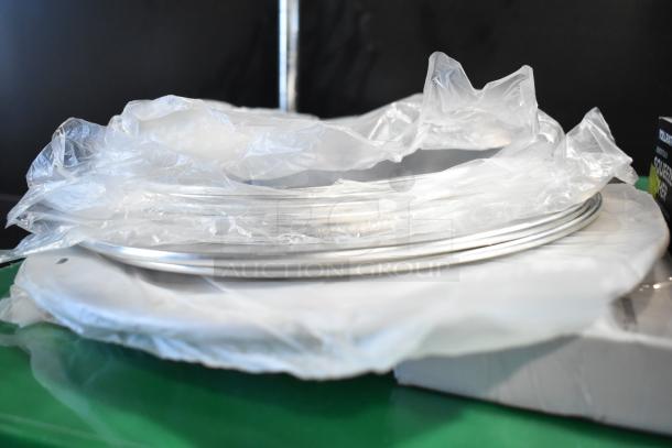 34 brand new scratch and dent items including stainless steel drop-in bins and cutting boards, sealed in plastic.