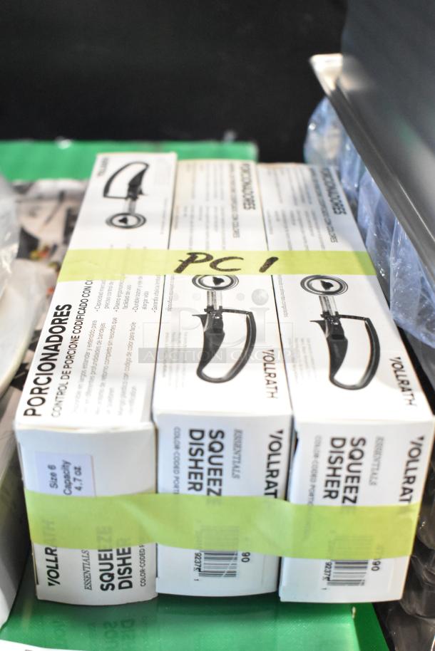 34 brand new Vollrath squeeze dishers in boxes, labeled "PC1". Scratch and dent, 34 items total for auction.