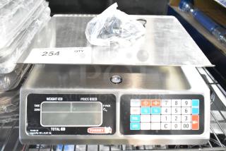 Brand new Torrey L-PC 40L 40 lb. digital price computing scale, legal for trade, with minor cosmetic scratches.