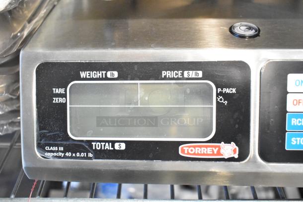 Brand new Torrey L-PC 40L digital scale, 40 lb. capacity, price computing, legal for trade, minor scratches and dents.